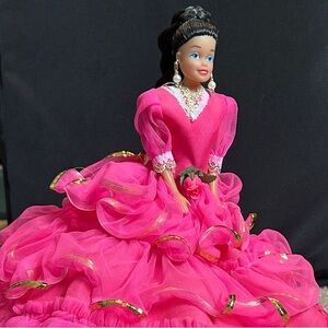Elegant Pink Doll with Gold Accents